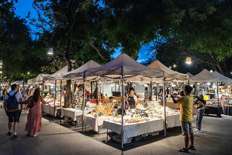 Pick up souvenirs at the art and handmade curios shops at Cicada night market